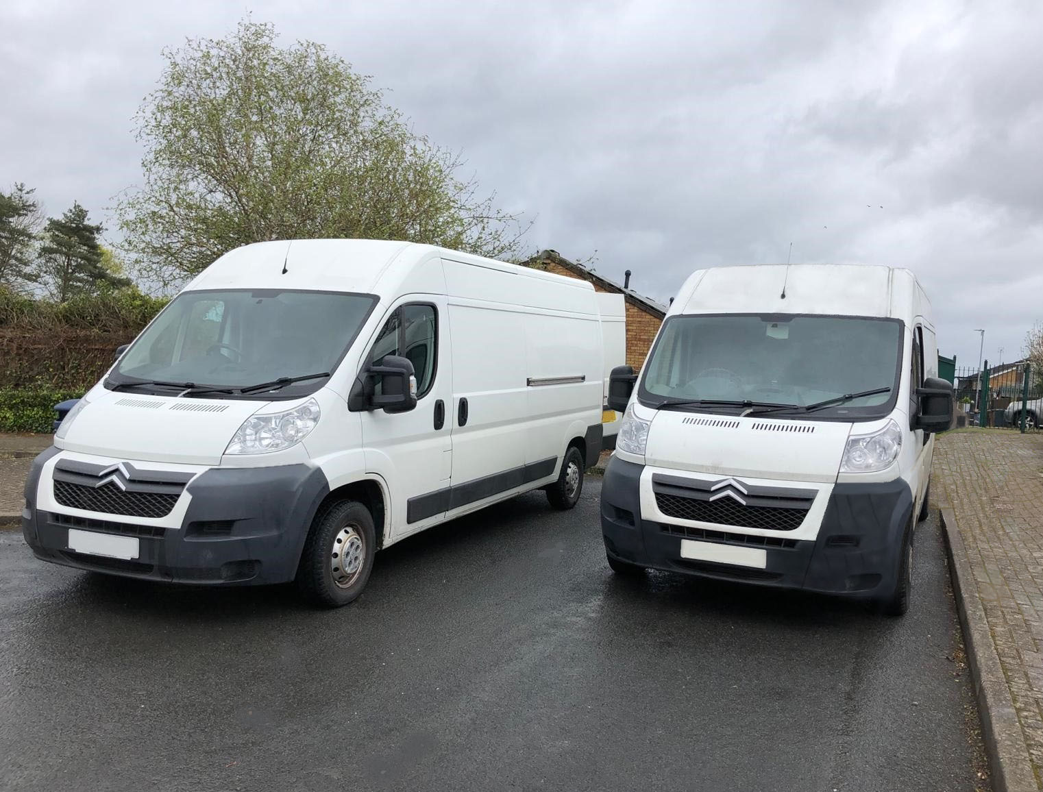 Man and Van this image shows two of our vans parked at a northampton home