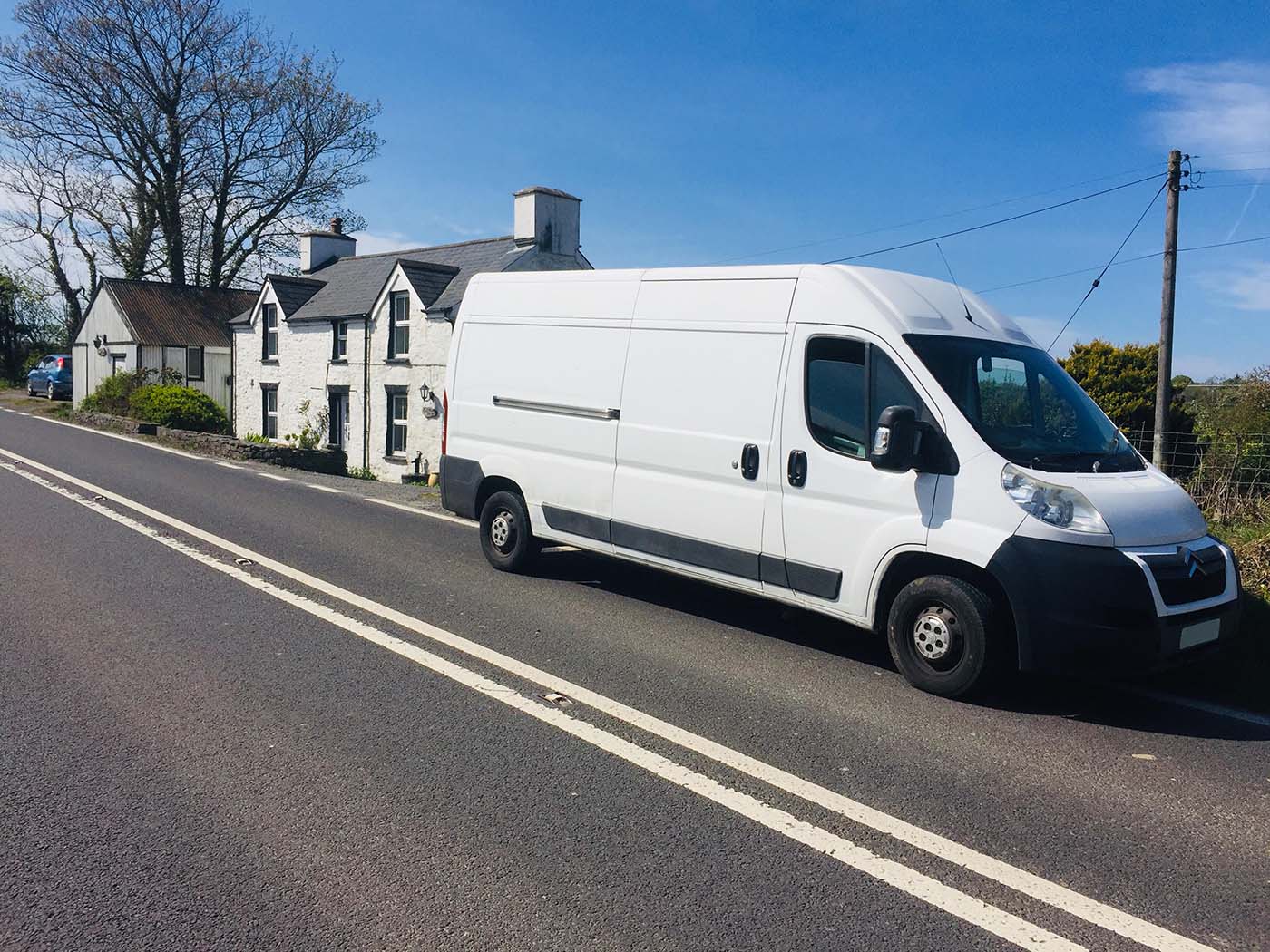 Terms of Use this image shows one of our vans parked in the beautiful Welsh countryside