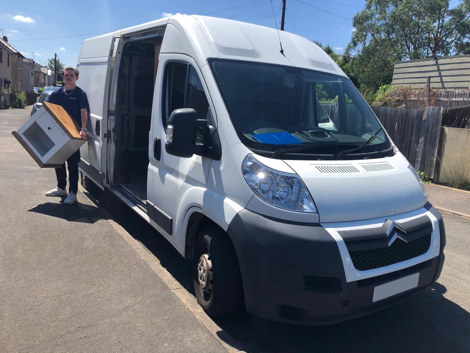 Single Items Collection and Delivery this picture shows us loading an single item into one of our vans